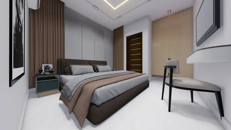 Bedroom with a panelled headboard wall and fitted wardrobe