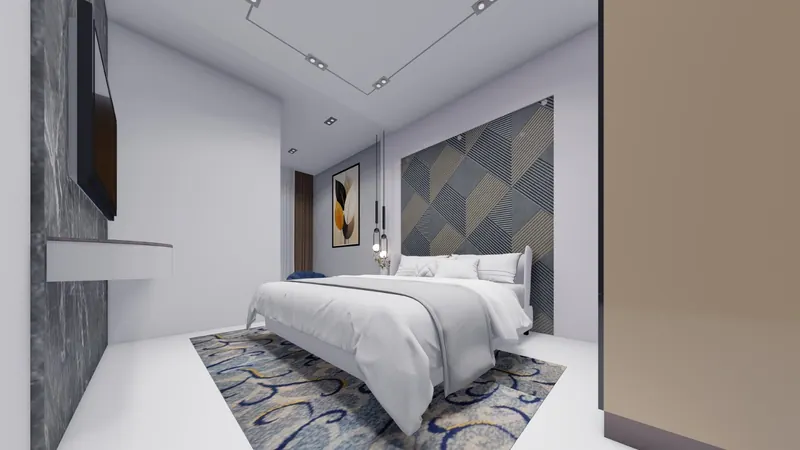 Bedroom with a patterned feature wall and pendant lights