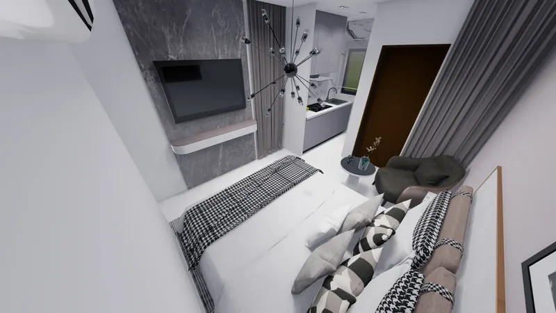 Studio apartment with a TV wall and kitchenette